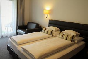 Posteľ alebo postele v izbe v ubytovaní Tschuggmall Appartements