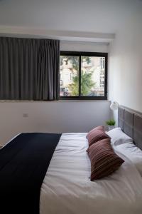 Postel nebo postele na pokoji v ubytování Johnny Hotel + 37 fotografií