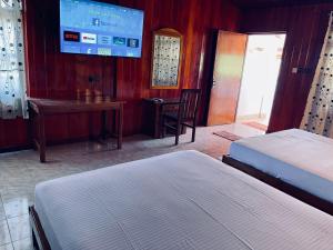 Postel nebo postele na pokoji v ubytování Anandas Beach Resort