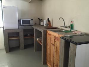 Η κουζίνα ή μικρή κουζίνα στο Kookfontein Farm Cottages +12 φωτογραφίες