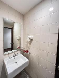 Ένα μπάνιο στο Alltrue Lite Hotel Nagoya Hill Batam