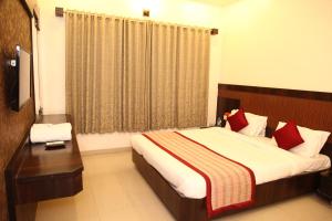 Katil atau katil-katil dalam bilik di Hotel Sai Ramanand