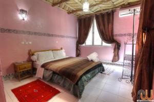 Postel nebo postele na pokoji v ubytování Kasbah Restaurant Amazir