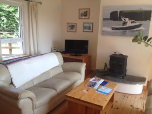 TV a/nebo společenská místnost v ubytování Glencarrig B&B + 7 fotografií