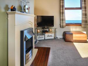 Et tv og/eller underholdning på Sea Breeze Cottage