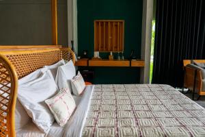 Ένα ή περισσότερα κρεβάτια σε δωμάτιο στο One Bedroom Nomad Pool Villas Canggu