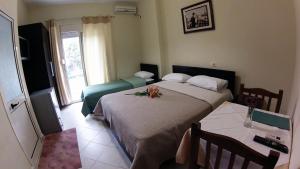 Ένα ή περισσότερα κρεβάτια σε δωμάτιο στο Hotel 4 Stinet