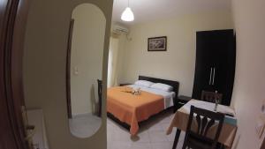 Ένα ή περισσότερα κρεβάτια σε δωμάτιο στο Hotel 4 Stinet