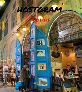 Restoran või mõni muu söögikoht majutusasutuses Hostgram Top View