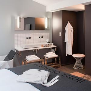 Letto o letti in una camera di Hôtel Quatorze