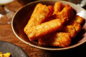 a bowl of fried food sitting on a table at Toyo Hotel in Fukuoka