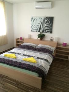 Postel nebo postele na pokoji v ubytování Apartmán Pasohlávky