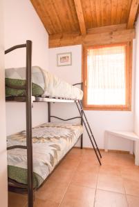 Postel nebo postele na pokoji v ubytování Blucamp Natural Village + 36 fotografií