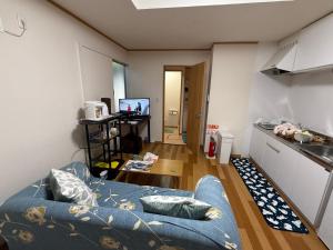 Uma televisão e/ou sistema de entretenimento em 西軽井沢小木屋