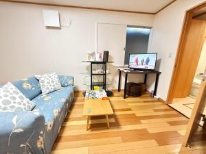 Uma televisão e/ou sistema de entretenimento em 西軽井沢小木屋