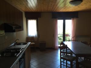 Kuchyň nebo kuchyňský kout v ubytování Hotel Iscla
