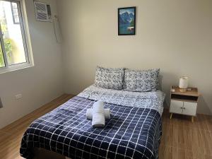 Postel nebo postele na pokoji v ubytování FHL transient house