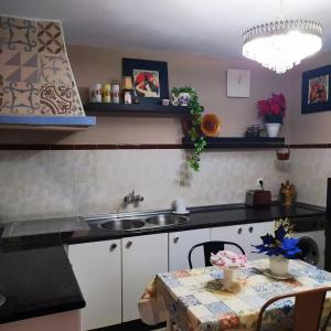 Kuchyň nebo kuchyňský kout v ubytování La casita de Denis