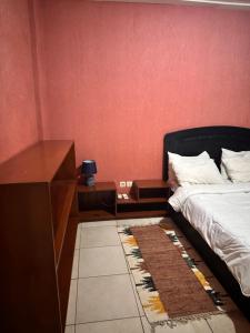 Postel nebo postele na pokoji v ubytování Bastos flat