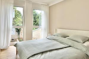 Letto o letti in una camera di Modernes Studio im Dachgeschoß