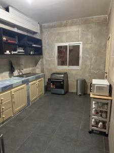 Kuchyň nebo kuchyňský kout v ubytování Bastos flat + 20 fotografií