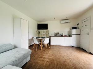 Η κουζίνα ή μικρή κουζίνα στο Domki u Zuzi w Sianożętach