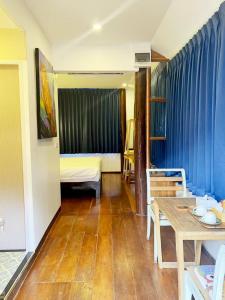 Ein Sitzbereich in der Unterkunft Pao Come Boutique House