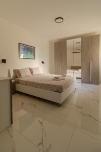 Postel nebo postele na pokoji v ubytování Penthouse with 3 bedroom