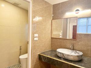 Ein Badezimmer in der Unterkunft Pao Come Boutique House