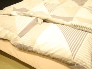 Кровать или кровати в номере FUMAI SAUNA&INN - Vacation STAY 66302v