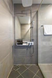 Koupelna v ubytování Hotel Wooin