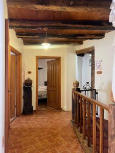 a hallway with a stairway leading to a bedroom at Rooms Poli Luce - Room Pepa in Gračišće