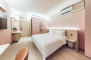 Katil atau katil-katil dalam bilik di Hanting Hotel Beijing Beiqing Road Zhongguancun Eco-friendly Park