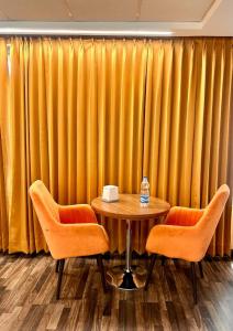 Posezení v ubytování Oasis Inn