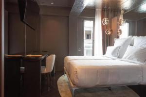 Adia Aluma Athens, Curio Collection By Hilton客房内的一张或多张床位