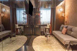 Adia Aluma Athens, Curio Collection By Hilton的休息区