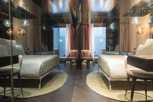 Adia Aluma Athens, Curio Collection By Hilton的休息区
