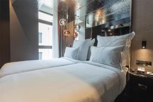 Adia Aluma Athens, Curio Collection By Hilton客房内的一张或多张床位