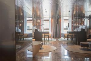 Adia Aluma Athens, Curio Collection By Hilton的休息区