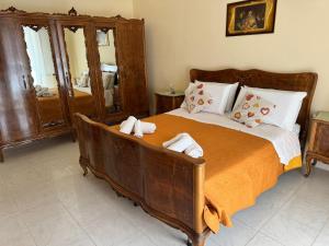 En eller flere senge i et værelse på Casa della nonna