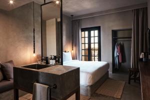 Cama ou camas em um quarto em Cook’s Club El Gouna (Adults Only)