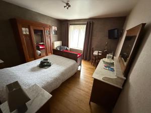 Krevet ili kreveti u jedinici u okviru objekta Arduinna's Nest B&B