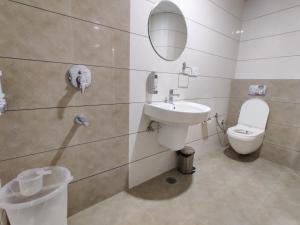 Koupelna v ubytování Oasis Inn