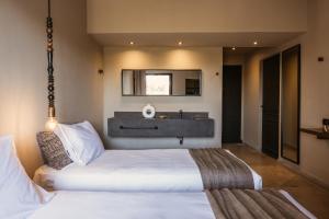 Cama ou camas em um quarto em Cook’s Club El Gouna (Adults Only)