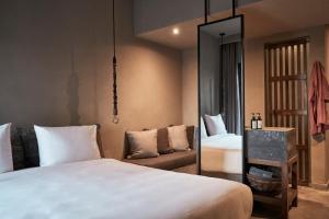 Cama ou camas em um quarto em Cook’s Club El Gouna (Adults Only)