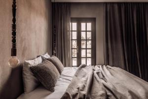 Cama ou camas em um quarto em Cook’s Club El Gouna (Adults Only)