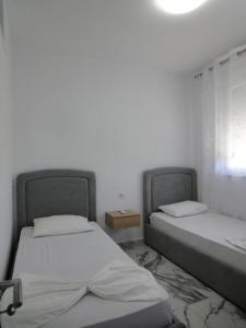 Una cama o camas en una habitación de Apartman Laguna View