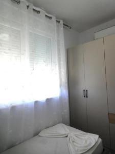 Una cama o camas en una habitación de Apartman Laguna View