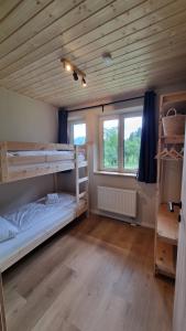 Una cama o camas en una habitación de Haus Nampolach 33 fotos más