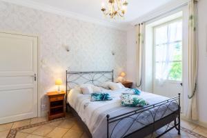 Posteľ alebo postele v izbe v ubytovaní Chambre D'hôtes Vignols